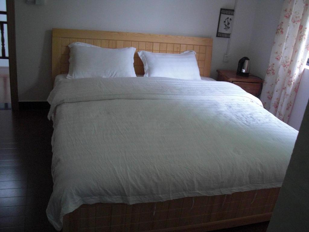 Huanggong Garden Hotel Yangshuo Rum bild